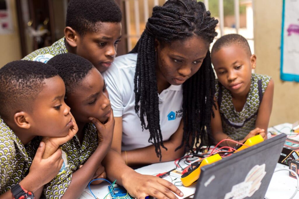 Community members collaborating on assistive technology design